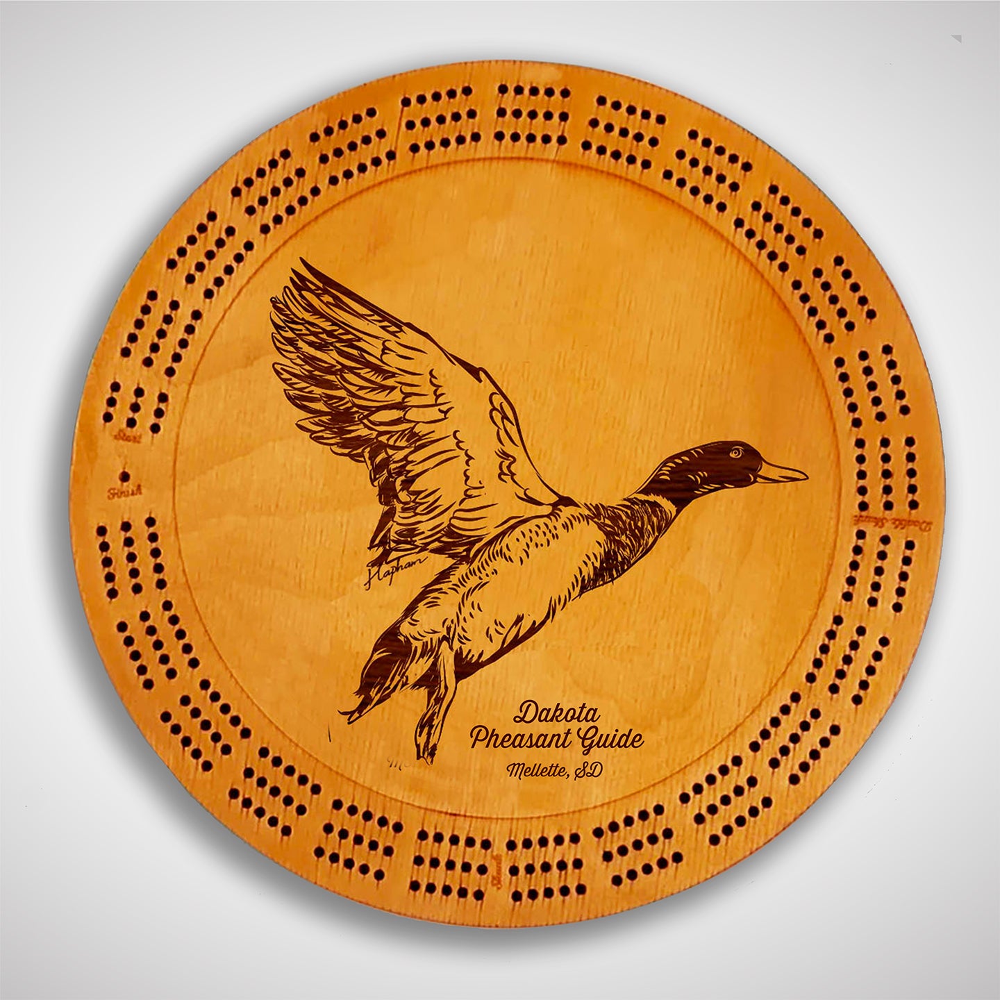 Crafted from high-quality wood, and featuring a laser-engraved Mallard Duck taking flight, this cribbage board allows you to bring memories of your outdoor adventures to your game. Enjoy the nostalgic feel and endless entertainment of this premium board. Show off your love for waterfowl and game birds while honing your cribbage skills. Perfect for any cabin or game room! A Dakota Pheasant Guide souvenir.