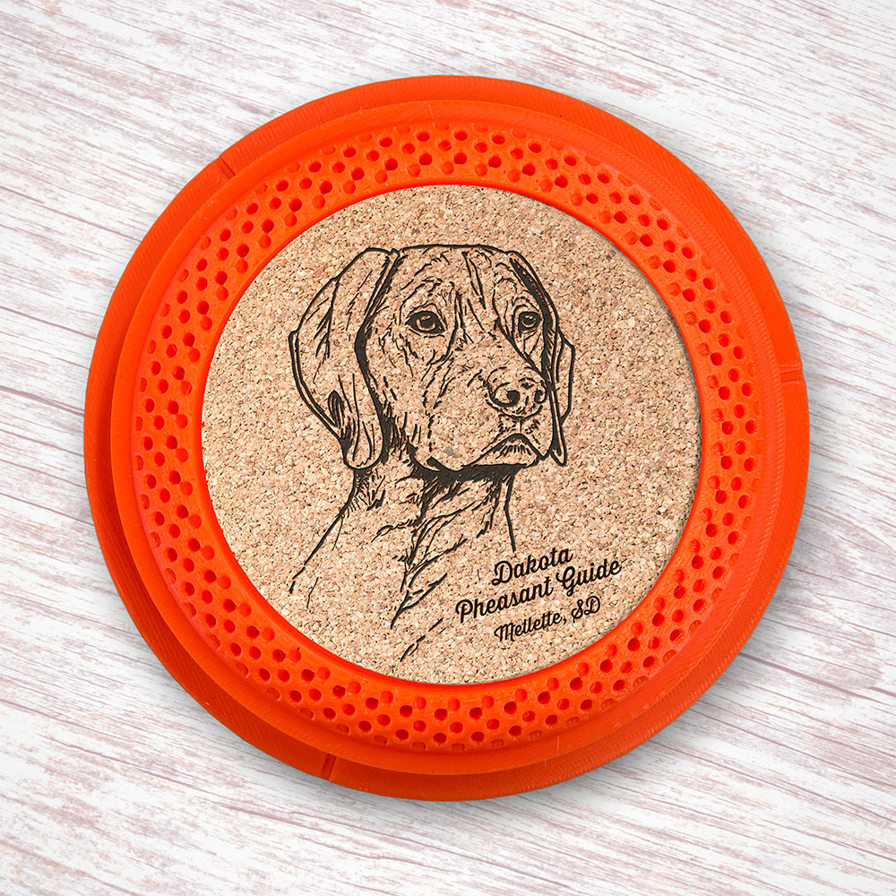 Clay Pigeon shaped coaster base with a laser-engraved cork insert featuring a German Shorthair Pointer - this set of 4 coasters makes a unique gift for any trap shooter, gun enthusiast and bird dog lover! By Muggins Gifts for the Dakota Pheasant Guide Souvenir shop.