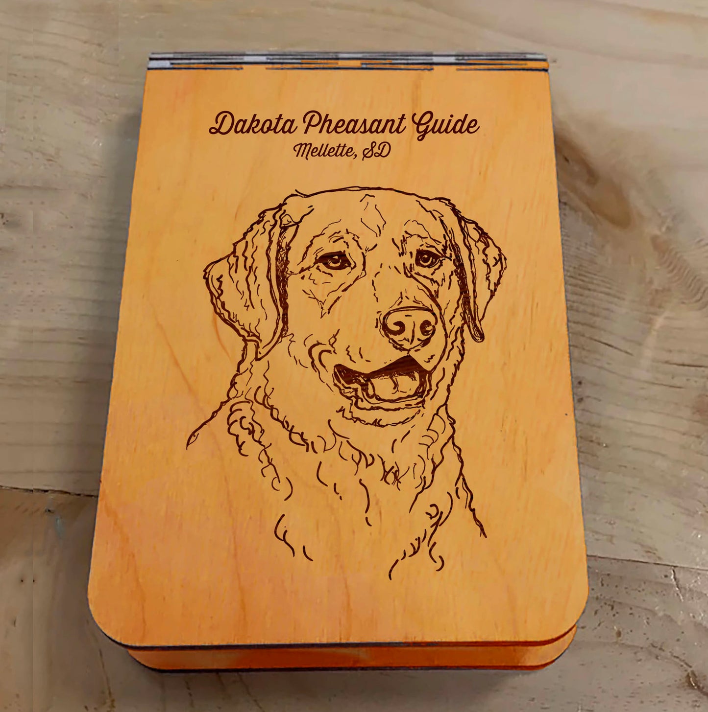 Featuring a laser-engraved Chesapeake Bay Retriever, this small wooden crib board is an ideal gift and travel companion for any dog lover. Enjoy hours of fun on the go, and make your next adventure memorable with our Travel Crib Board! A Dakota Pheasant Guide souvenir.