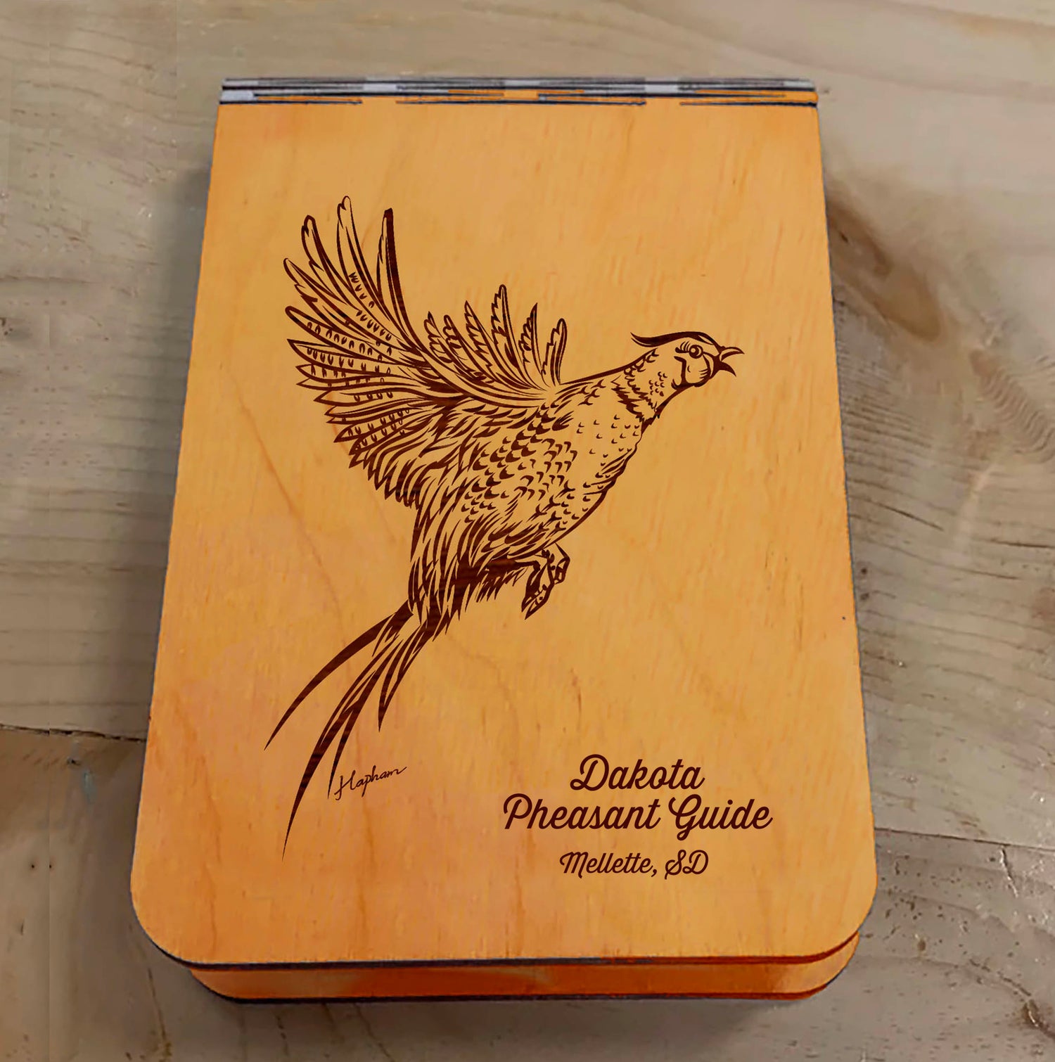 Featuring a laser-engraved Pheasant taking flight, this small wooden crib board is an ideal gift and travel companion for any game bird and hunting enthusiast. Enjoy hours of fun on the go, and make your next adventure memorable with our Travel Crib Board! A Dakota Pheasant Guide souvenir.