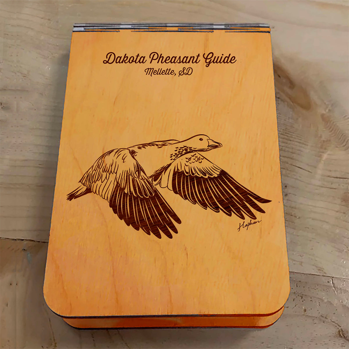 Featuring a laser-engraved Snow Goose in flight, this small wooden crib board is an ideal gift and travel companion for any game bird and waterfowl hunting enthusiast. Enjoy hours of fun on the go, and make your next adventure memorable with our Travel Crib Board! A Dakota Pheasant Guide souvenir.