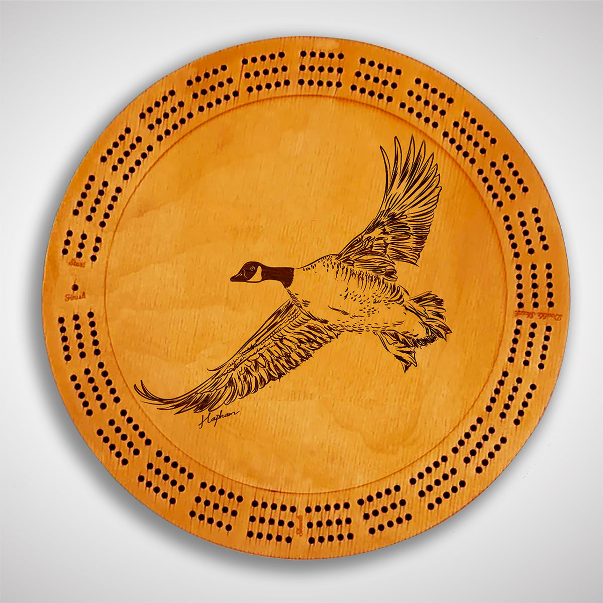 Crafted from high-quality wood, and featuring a laser-engraved Canada Goose in flight, this cribbage board allows you to bring memories of your outdoor adventures to your game. Enjoy the nostalgic feel and endless entertainment of this premium board. Show off your love for waterfowl and game birds while honing your cribbage skills. Perfect for any cabin or game room! A Dakota Pheasant Guide souvenir.