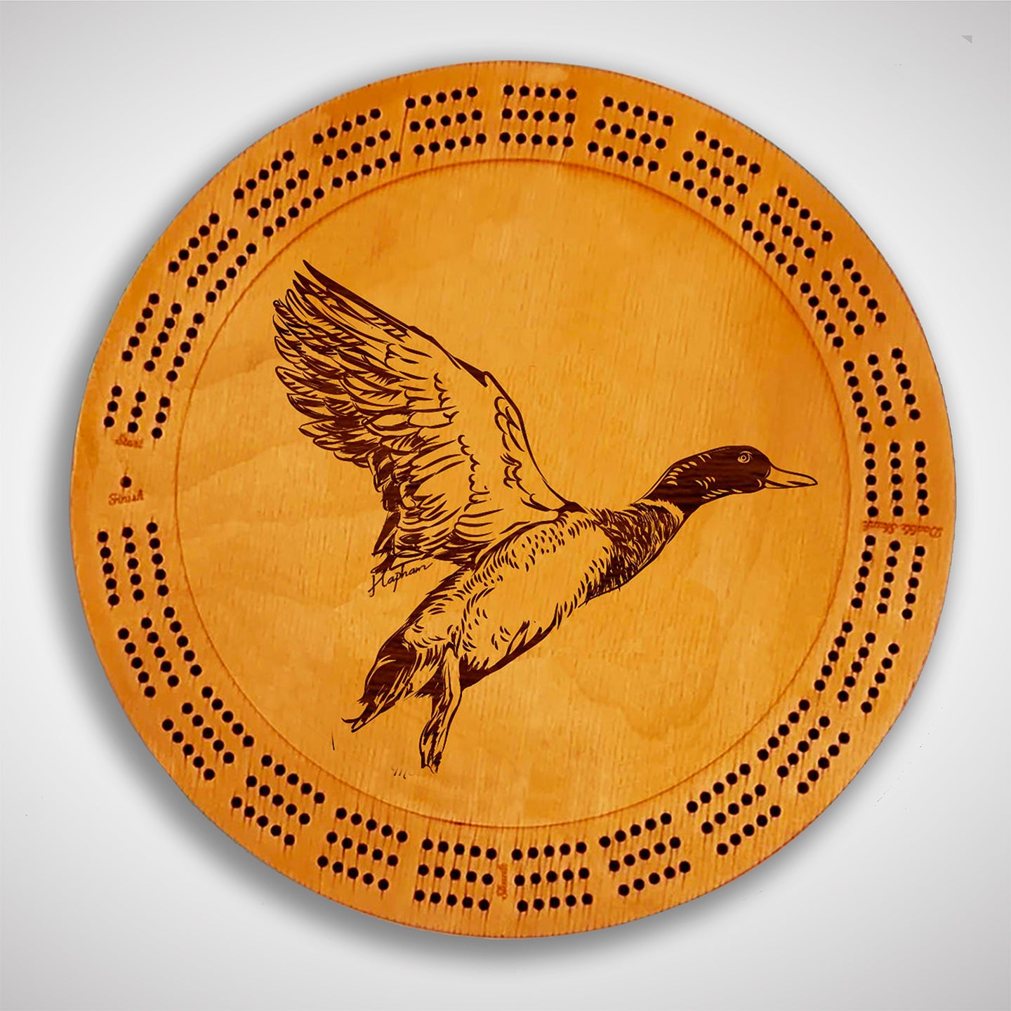 Crafted from high-quality wood, and featuring a laser-engraved Mallard Duck taking flight, this cribbage board allows you to bring memories of your outdoor adventures to your game. Enjoy the nostalgic feel and endless entertainment of this premium board. Show off your love for waterfowl and game birds while honing your cribbage skills. Perfect for any cabin or game room! A Dakota Pheasant Guide souvenir.