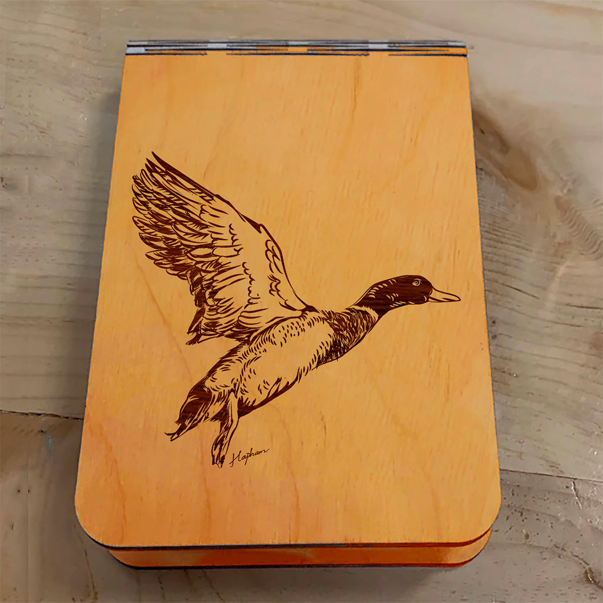 Featuring a laser-engraved Mallard Duck taking flight, this small wooden crib board is an ideal gift and travel companion for any game bird and waterfowl hunting enthusiast. Enjoy hours of fun on the go, and make your next adventure memorable with our Travel Crib Board! A Dakota Pheasant Guide souvenir.