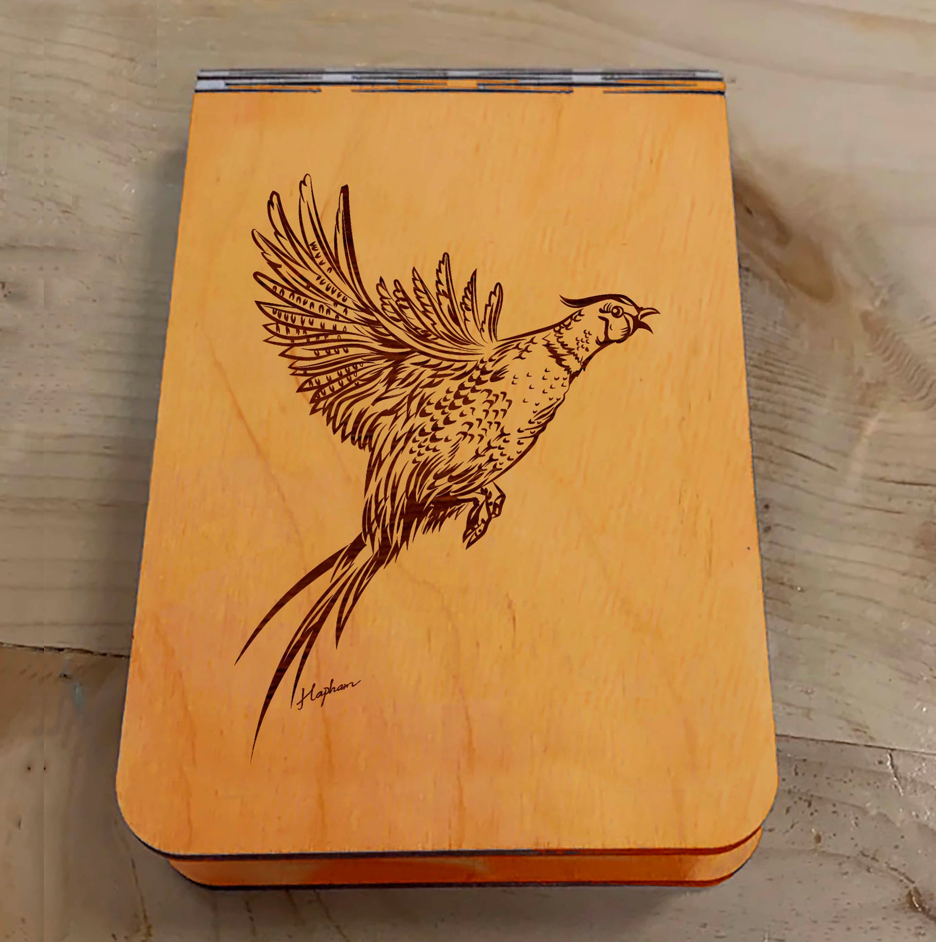 Featuring a laser-engraved Pheasant taking flight, this small wooden crib board is an ideal gift and travel companion for any game bird and hunting enthusiast. Enjoy hours of fun on the go, and make your next adventure memorable with our Travel Crib Board! A Dakota Pheasant Guide souvenir.