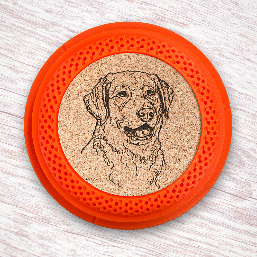 Clay Pigeon shaped coaster base with a laser-engraved cork insert featuring a Chesapeake Bay Retriever - this set of 4 coasters makes a unique gift for any trap shooter, gun enthusiast and bird dog lover! By Muggins Gifts for the Dakota Pheasant Guide Souvenir shop.